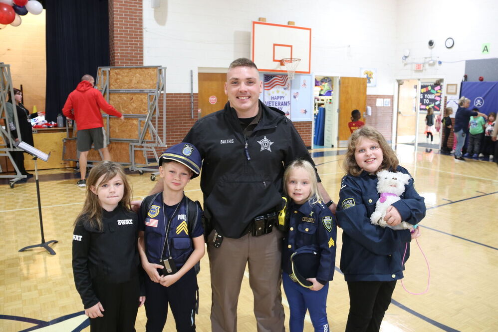 Sheriff Deputy with group of kids